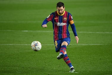 (FILES) In this file photo taken on February 24, 2021 Barcelona's Argentinian forward Lionel Messi kicks the ball during the Spanish league football match between FC Barcelona and Elche CF at the Camp Nou stadium in Barcelona.  - Lionel Messi will end his 20-year career with Barcelona after the Argentine superstar failed to reach agreement on a new deal with the club, the Spanish giants announced on August 5, 2021.  (Photo by LLUIS GENE  /  AFP)