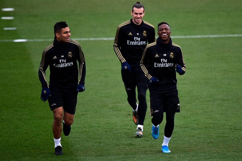 Real Madrid's Casemiro, Vinicius Junior and Gareth Bale attend a training session. AFP