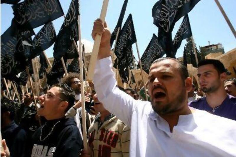 Supporters of Hizb ut Tahrir protest against the Syrian regime in the northern Lebanese city of Tripoli on April 22.