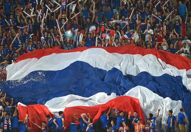 Thailand’s fans celebrate Tana Cahnubat’s goal. Tom Dulat / Getty Images
