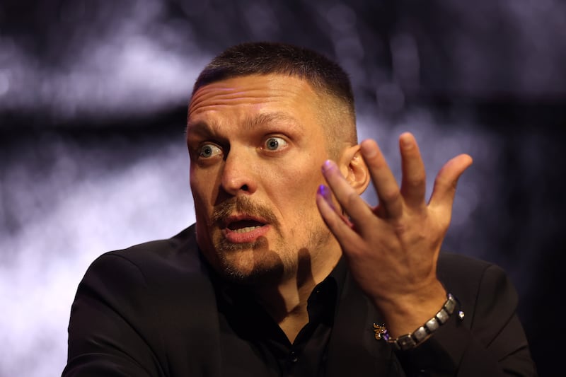 Oleksandr Usyk reacts during the press conference at Outernet London. Getty 