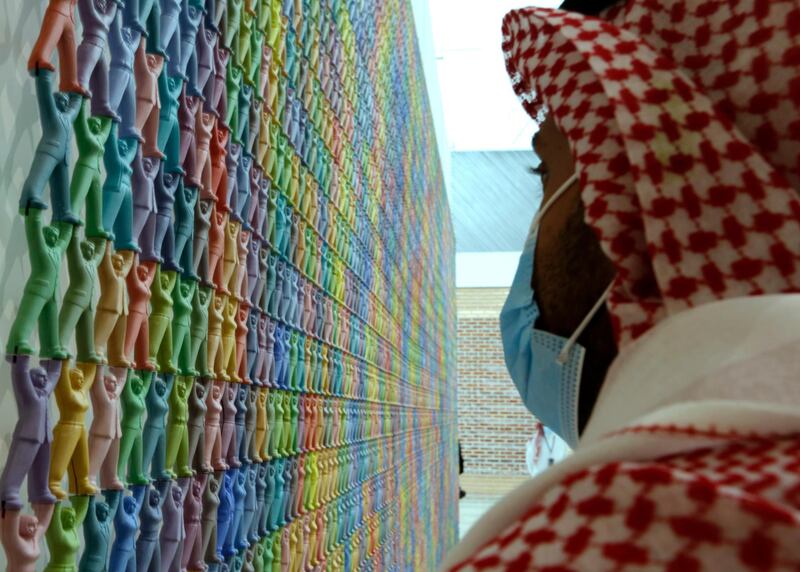 A visitor looks at a piece by Korean artist Do Ho-suh at the King Abdulaziz Centre for World Culture, also known as Ithra, in Dammam, Saudi Arabia. AP
