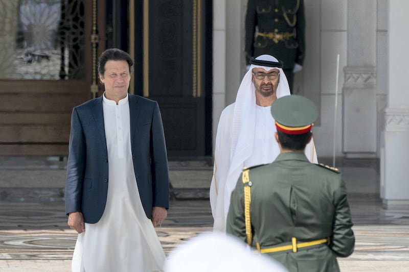 ABU DHABI, UNITED ARAB EMIRATES - November 18, 2018: HH Sheikh Mohamed bin Zayed Al Nahyan Crown Prince of Abu Dhabi Deputy Supreme Commander of the UAE Armed Forces (R) and HE Imran Khan, Prime Minister of Pakistan (L), stand for the national anthem, during a reception held at the Presidential Palace.

( Rashed Al Mansoori / Ministry of Presidential Affairs )
---