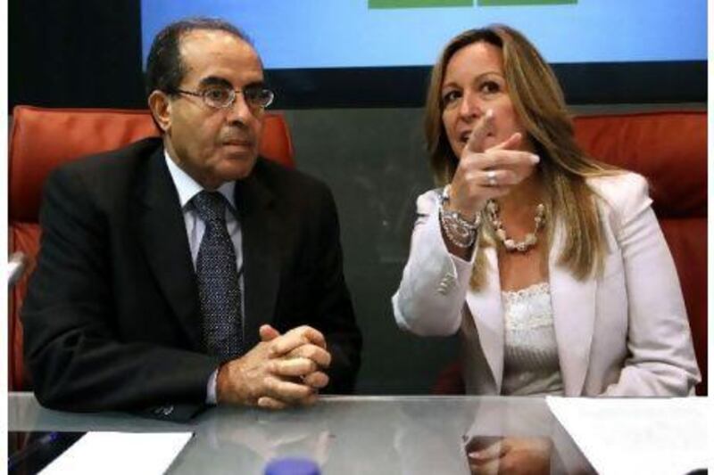 Spanish foreign minister Trinidad Jimenez, right, talks to Mahmoud Jibril, executive bureau chairman of the transitional national council in Libya, before their joint news conference at the foreign ministry in Madrid yesterday. Andrea Comas / Reuters