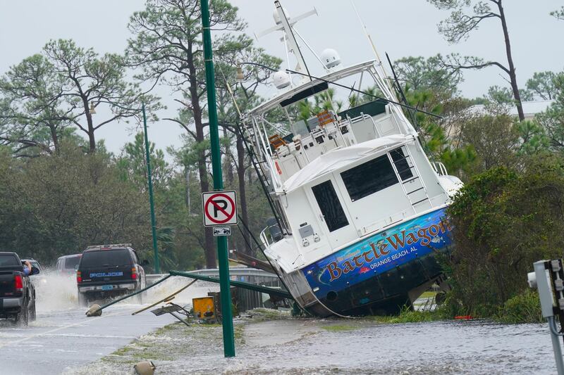 A boat is washed up near a road after Hurricane Sally moved through the area, in Orange Beach, Alabama. AP Photo