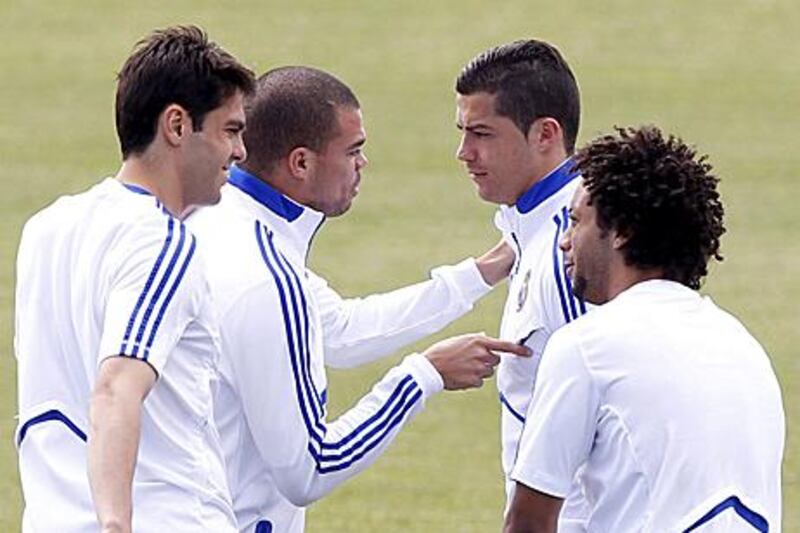 Real Madrid players look relaxed at training yesterday.