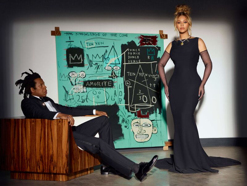 Beyonce and Jay-Z pose in front of Jean-Michel Basquiat's ​'Equals Pi', a work from 1982. Photo: Tiffany & Co