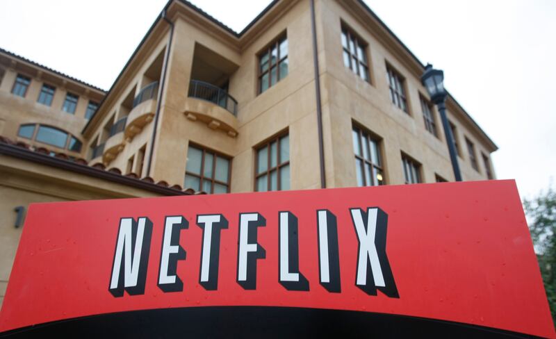 Netflix plans to sell about four minutes of commercials per hour for the ad-supported service. AP