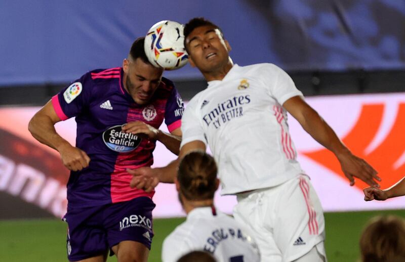 Real Madrid's Carlos Henrique Casemiro in action against Valladolid's Bruno Gonzalez. EPA