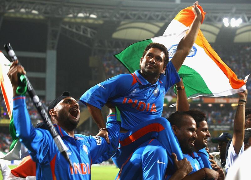 MUMBAI, INDIA - APRIL 02:  Sachin Tendulkar and Harbhajan Singh of India celebrate their teams win during the 2011 ICC World Cup Final between India and Sri Lanka at the Wankhede Stadium on April 2, 2011 in Mumbai, India.  (Photo by Matthew Lewis/Getty Images)