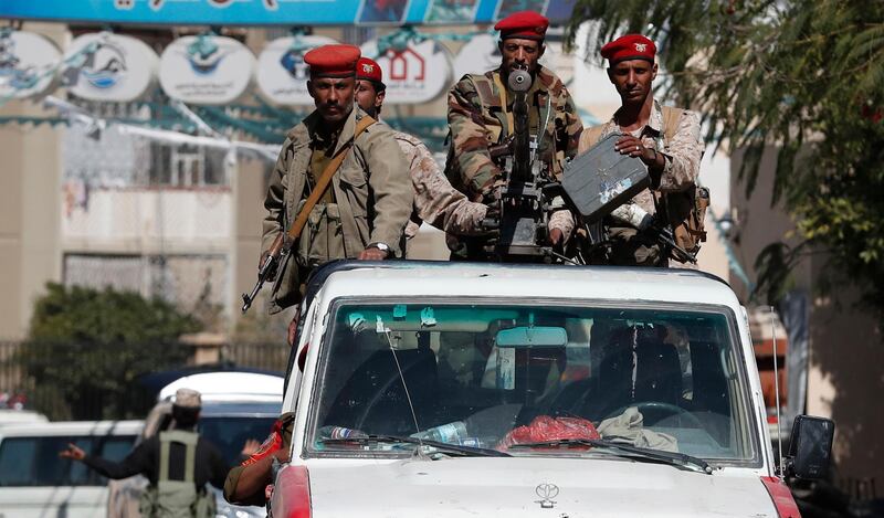 epa09019307 Pro-Houthi soldiers ride a truck as they patrol in Sanaâ€™a, Yemen, 17 February 2021. Yemen has been in the grip of an escalating fighting since late 2014 after the Houthis gained control of most of the northern part of Yemen and forced the Saudi-backed Yemeni government into exile.  EPA/YAHYA ARHAB