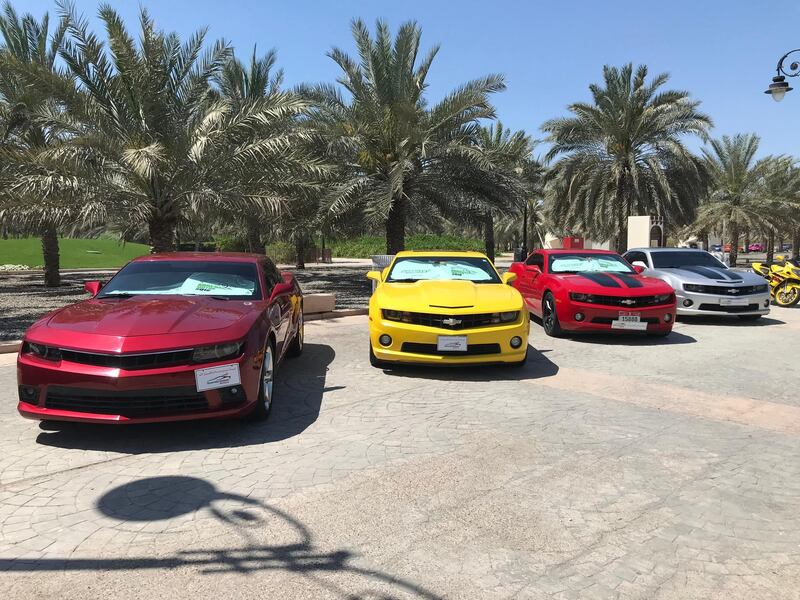 Several Chevrolet Camaros represent modern muscle cars at the show. Adam Workman / The National