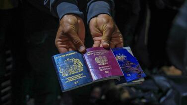 British, Polish and Australian passports belonging to the World Central Kitchen workers killed in an Israeli strike in Gaza last month. AFP