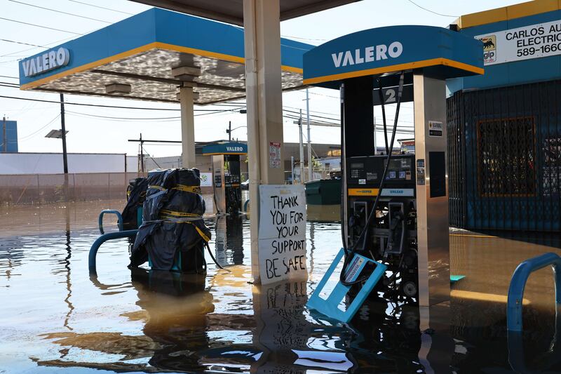 A flooded Valero gas station is seen on South Street on September 2, 2021 in Newark, New Jersey as Governor Phil Murphy declared a state of emergency due to Tropical Storm Ida which caused flooding and power outages throughout the state. AFP
