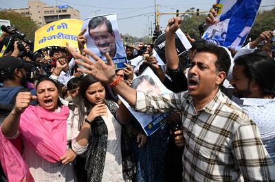 Demonstrators protesting against the arrest of Delhi Chief Minister Arvind Kejriwal in the Indian capital on Friday. Bloomberg