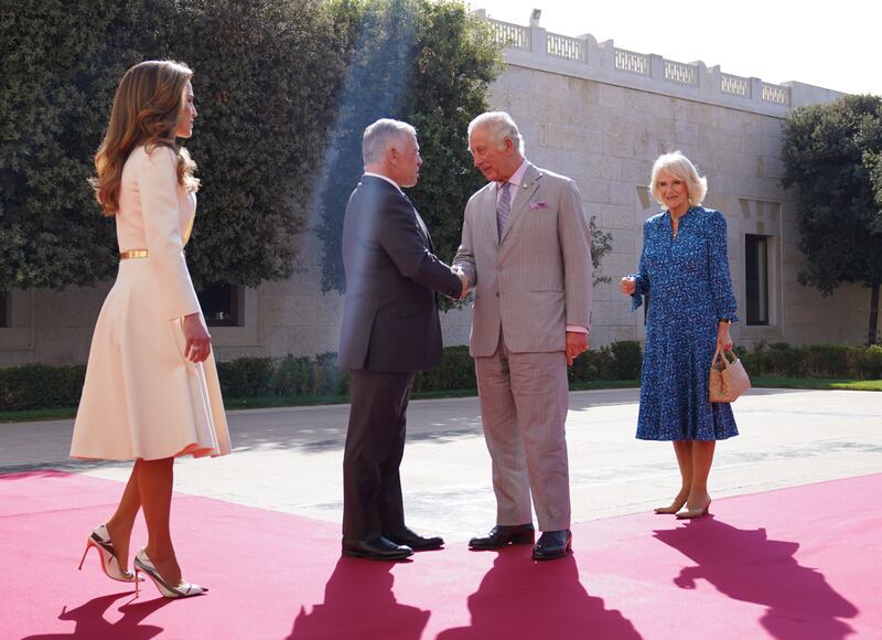 At the palace, the British royals were welcomed by Jordan's King Abdullah II and Queen Rania. EPA