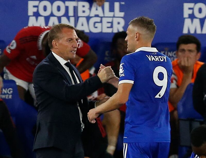 Leicester City manager Brendan Rodgers shakes hands with Jamie Vardy after he was substituted. Reuters