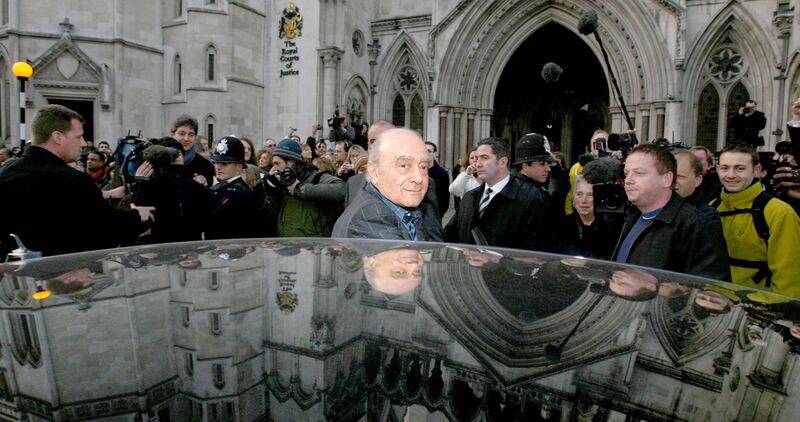 Mohamed Al-Fayed leaves the High Court in London after giving evidence at the inquest into the death of his son, Dodi, and Diana, Princess of Wales. PA/AP