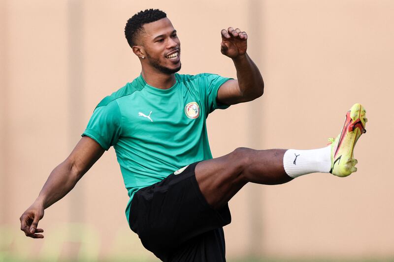 Keita Balde stretches during a training session. AFP