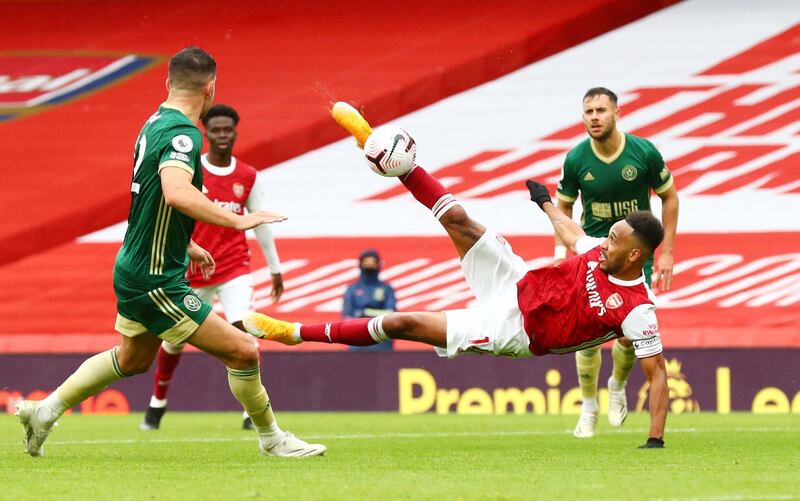 Soccer Football - Premier League - Arsenal v Sheffield United - Emirates Stadium, London, Britain - October 4, 2020 Arsenal's Pierre-Emerick Aubameyang shoots at goal Pool via REUTERS/Clive Rose EDITORIAL USE ONLY. No use with unauthorized audio, video, data, fixture lists, club/league logos or 'live' services. Online in-match use limited to 75 images, no video emulation. No use in betting, games or single club /league/player publications.  Please contact your account representative for further details.     TPX IMAGES OF THE DAY