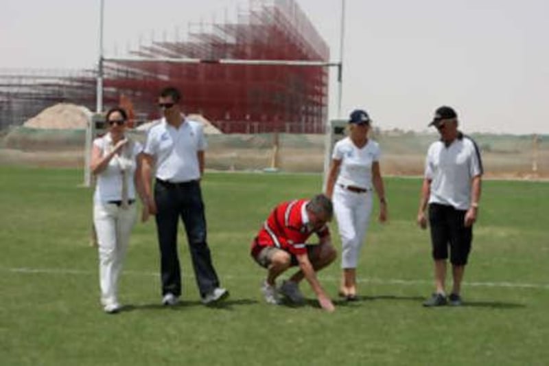 From left to right: Bettina Jordan (Emirates Airlines), Kit McConnel (IRB), Gary Chapman (Emirates Airline), Beth Coalter (IRB) and Jim Fitzmons (AGRFU) inspect the ground.