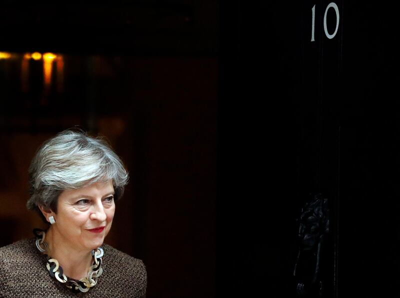 British Prime Minister Theresa May walks out at 10 Downing Street to meet European Council President Donald Tusk in London, Tuesday, Sept. 26, 2017.(AP Photo/Frank Augstein)