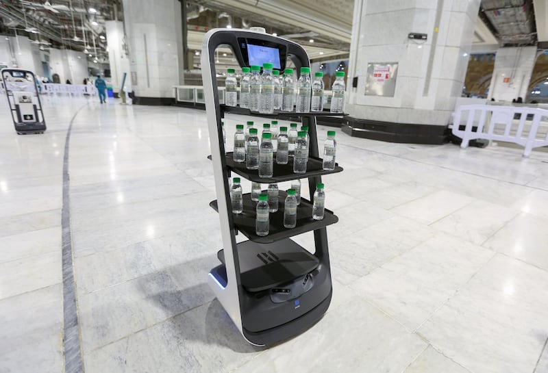 A smart robot used for the first time at the Grand Mosque in Saudi Arabia's holy city of Mecca, supplying worshippers with bottles of Zamzam water to reduce direct contact with staff as a measure to prevent Covid-19 infections spreading during the yearly Hajj pilgrimage.