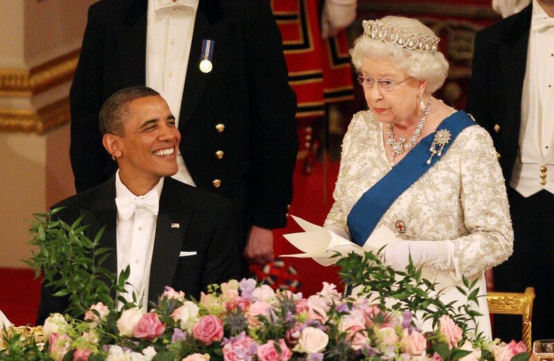 LONDON, ENGLAND - MAY 24:  U.S. President Barack Obama and Queen Elizabeth II during a State Banquet in Buckingham Palace on May 24, 2011 in London, England. The 44th President of the United States, Barack Obama, and his wife Michelle are in the UK for a two day State Visit at the invitation of HM Queen Elizabeth II. During the trip they will attend a state banquet at Buckingham Palace and the President will address both houses of parliament at Westminster Hall. (Photo by Lewis Whyld - WPA Pool/Getty Images)