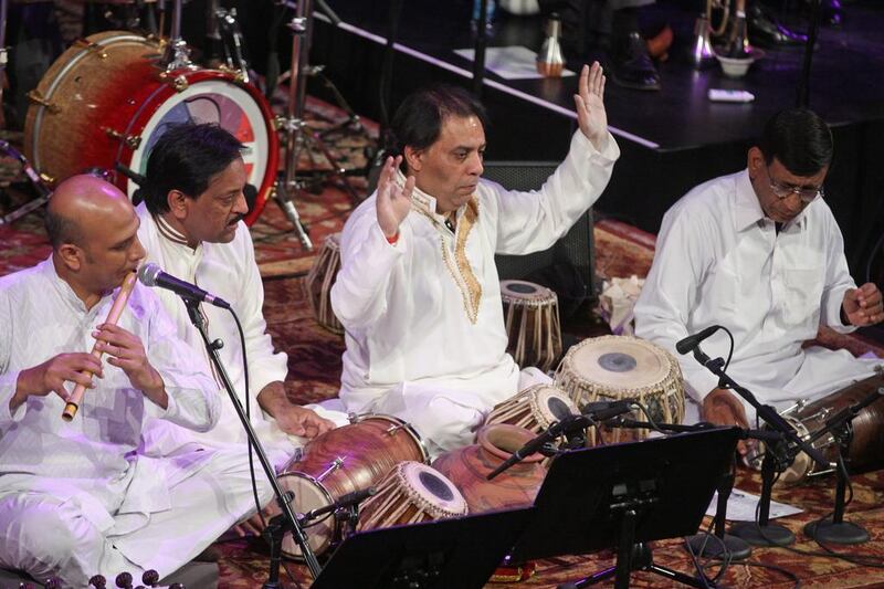 The Sachal Ensemble perform with Wynton Marsalis and the Jazz at Lincoln Center Orchestra in New York in 2013. From left, Baqar Abbas, Najaf Ali, Ballu Khan and Rafiq Ahmed. Hiroyuki Ito / Getty Images.