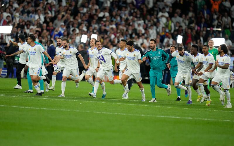 Real Madrid players celebrate. AP