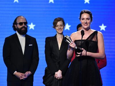 SANTA MONICA, CALIFORNIA - JANUARY 12: Phoebe Waller-Bridge (R) accepts the Best Comedy Series award for 'Fleabag' onstage during the 25th Annual Critics' Choice Awards at Barker Hangar on January 12, 2020 in Santa Monica, California.   Amy Sussman/Getty Images/AFP
== FOR NEWSPAPERS, INTERNET, TELCOS & TELEVISION USE ONLY ==
