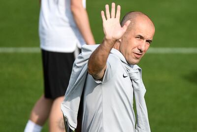 (FILES) In this file photo taken on September 17, 2018, Monaco's Portuguese coach Leonardo Jardim gestures as he arrives to lead Monaco's football team training session, at training camp in La Turbie near Monaco, on the eve of the Champions League football match between Monaco and Atletico Madrid.  Monaco, languishing 18th in Ligue 1, said october 11, 2018, that that they have "put an end to their collaboration with Leonardo Jardim," the coach who led them to a French title in 2017.  The 44-year-old Portuguese, at Monaco since 2014, also took the club to a Champions League semi-final, but his team have not won in Ligue 1 since their opening match and have lost both their Champions League group games.
 / AFP / YANN COATSALIOU

