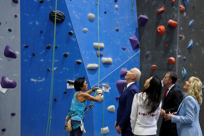 U.S. President Joe Biden and first lady Jill Biden meet with Virginia Governor Ralph Northam to discuss the state's progress against the coronavirus disease pandemic at Sportrock Climbing Centers in Alexandria, Virginia. Reuters