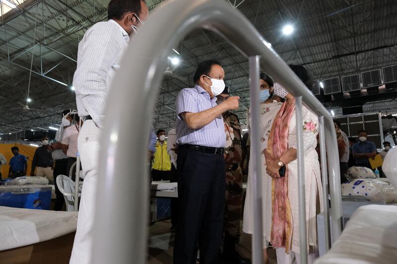 Harsh Vardhan, India's health minister, inspects a Covid-19 centre in the capital city of New Delhi. India is now the global coronavirus hotspot, setting daily new records for the world's highest number of cases. Bloomberg