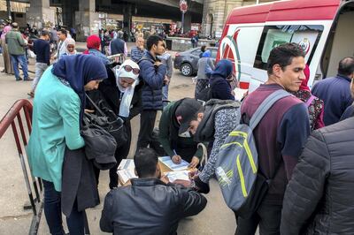 Hundreds rushed to donate blood in ambulances parked in Ramses Square in front of the train station. Courtesy Mahmoud Fekry