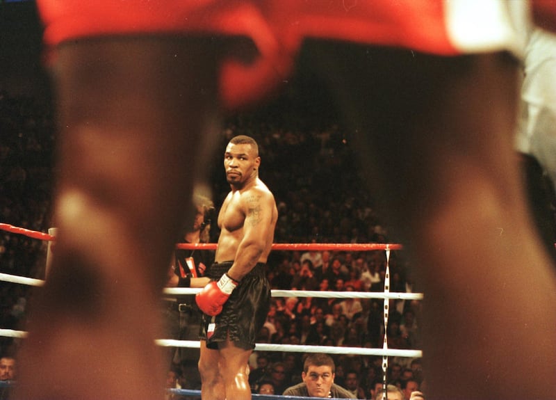 16 Mar 1996:  Mike Tyson looks across the ring at Frank Bruno prior to the start of the first round of the WBC Heavyweight Championship bout at the MGM Grand in Las Vegas, Nevada.  Tyson won the title after referee Mills Lane stopped the fight in the third round. Getty Images