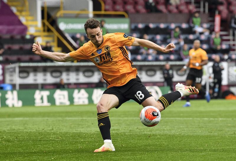 BURNLEY, ENGLAND - JULY 15: Diogo Jota of Wolverhampton Wanderers shoots during the Premier League match between Burnley FC and Wolverhampton Wanderers at Turf Moor on July 15, 2020 in Burnley, England. Football Stadiums around Europe remain empty due to the Coronavirus Pandemic as Government social distancing laws prohibit fans inside venues resulting in all fixtures being played behind closed doors. (Photo by Paul Ellis/Pool via Getty Images)