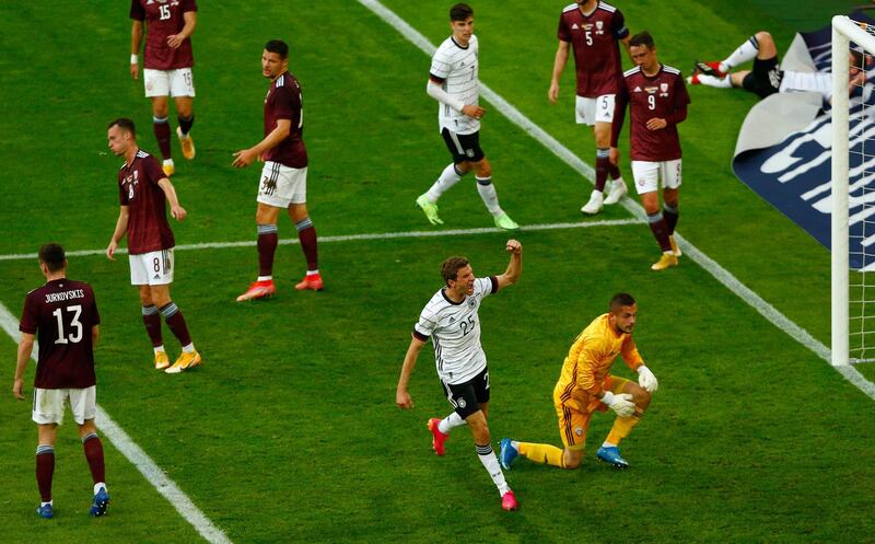 Germany's forward Thomas Mueller celebrates scoring the third goal during the friendly against Latvia in Duesseldorf on Monday. AFP