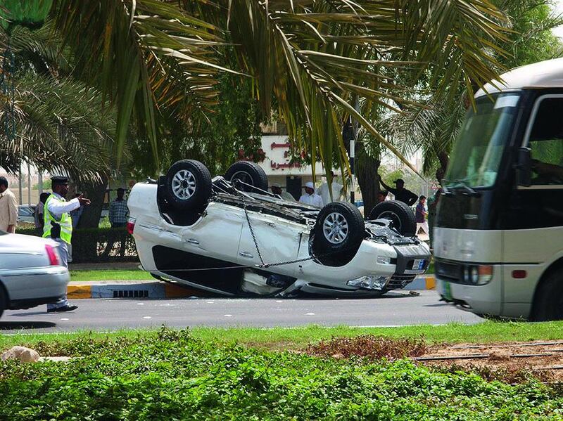 An overturned car after an accident in Abu Dhabi. Manuel Salazar / The National