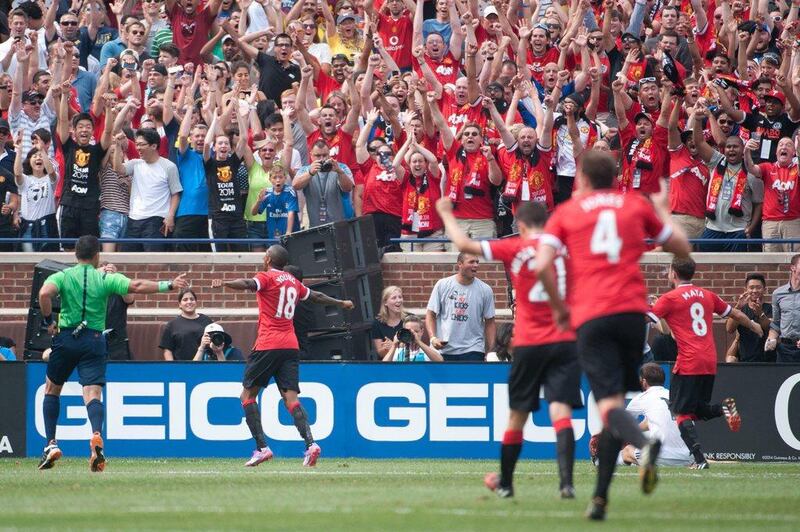 Ashley Young, No 18, celebrates after scoring one of his two goals for Manchester United in their win over Real Madrid on Saturday. Tim Fuller / USA Today Sports / August 2, 2014