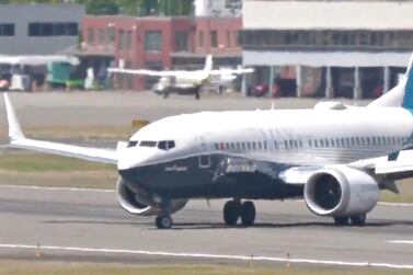 A Boeing 737-7 Max aircraft lands at north side of Boeing Field in Seattle, Washington, US, after completing a flight testing to be re-certified on June 29, 2020. Reuters. 