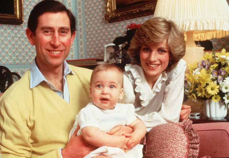 The Prince and Princess of Wales with baby Prince William in Kensington Palace in 1983