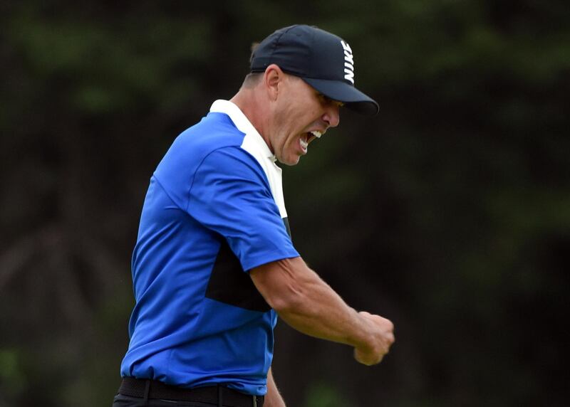 Brooks Koepka reacts after sinking a putt on the 18th green to win the PGA Championship. AP Photo