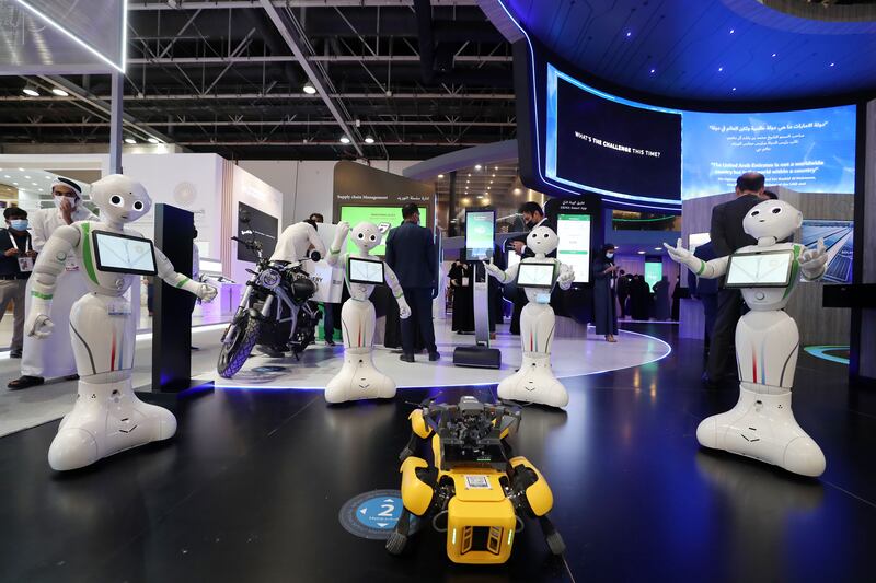 Robots dance to the Expo theme at the Dewa stand at Gitex.