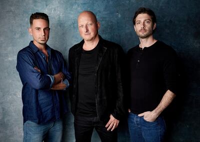 Wade Robson, from left, director Dan Reed and James Safechuck pose for a portrait to promote the film "Leaving Neverland" at the Salesforce Music Lodge during the Sundance Film Festival on Thursday, Jan. 24, 2019, in Park City, Utah. (Photo by Taylor Jewell/Invision/AP)
