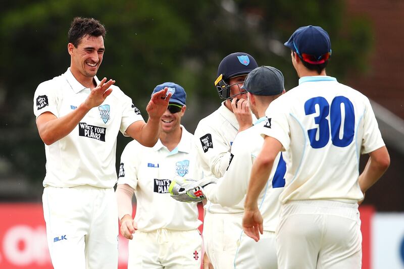 SYDNEY, AUSTRALIA - NOVEMBER 06:  Mitchell Starc of the Blues celebrates with his team mates after trapping David Moody of the Warriors LBW to claim the second of his three wickets in his hat-trick during day three of the Sheffield Shield match between New South Wales and Western Australia at Hurstville Oval on November 6, 2017 in Sydney, Australia.  (Photo by Mark Kolbe/Getty Images)