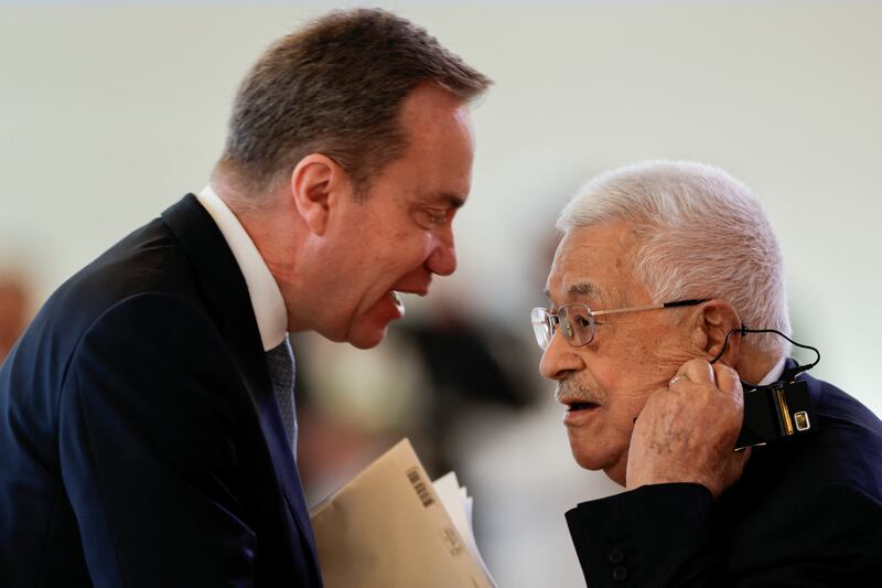 President of the WEF, Borge Brende, speaks to Palestinian President, Mahmoud Abbas. Reuters