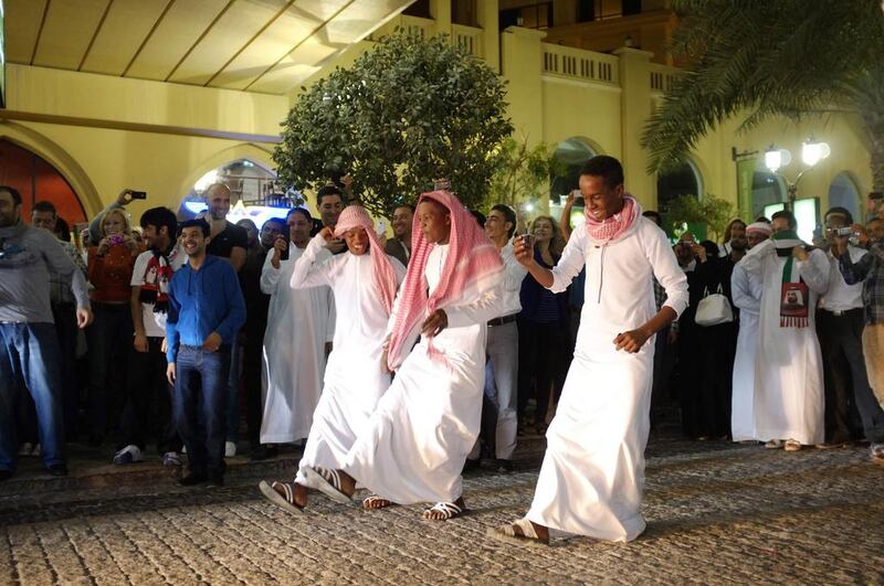 National Day celebrations on JBR Walk in Dubai. While Emiratis welcome visitors and expats, they feel that an understanding of Arab culture and tradition is very important. Antonie Robertson / The National