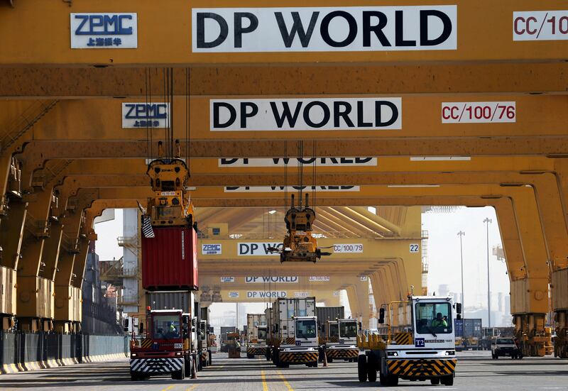 Terminal tractors line up to load containers into a cargo ship at DP World's Terminal 2 at Jebel Ali Port in Dubai. Reuters