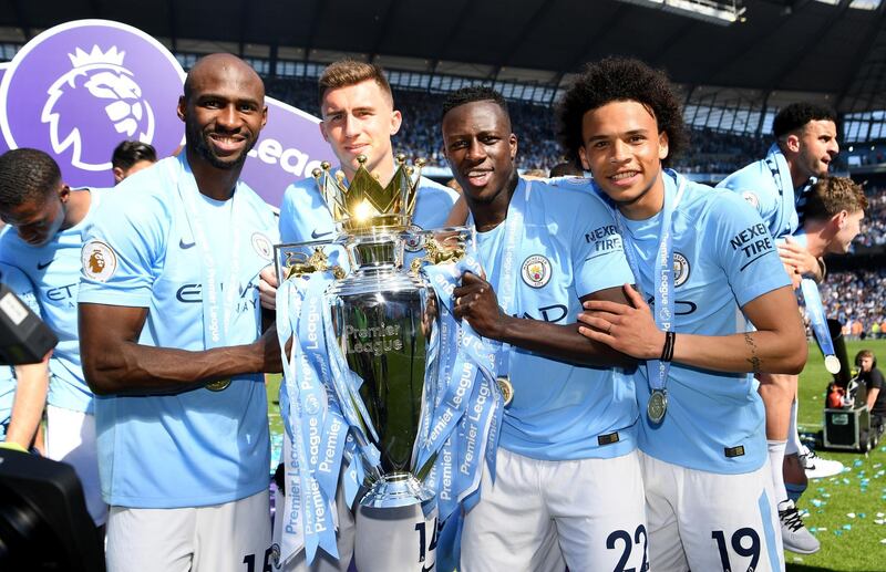 Eliaquim Mangala, Aymeric Laporte, Benjamin Mendy and Leroy Sane celebrate winning the Premier League title.  Michael Regan / Getty Images